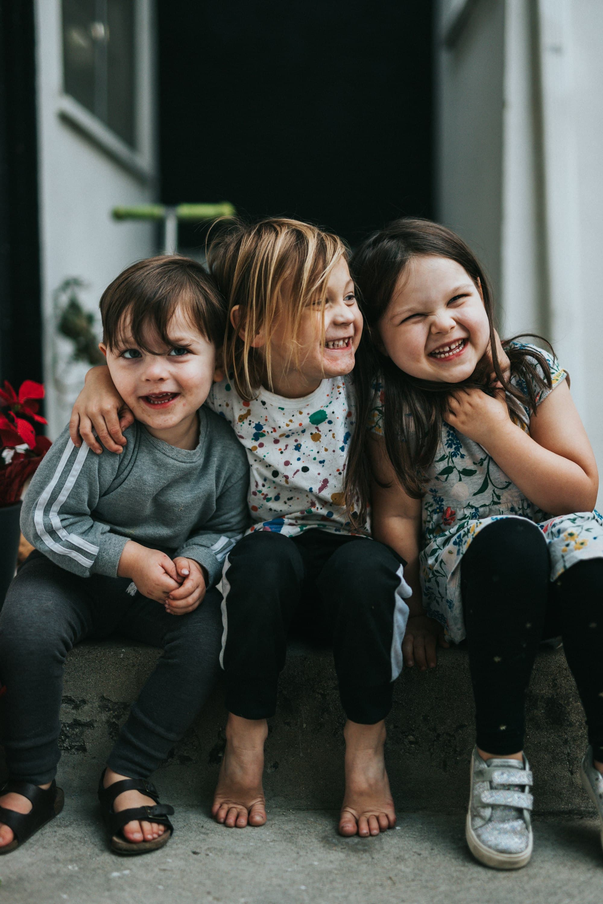 A group of young students laughing together